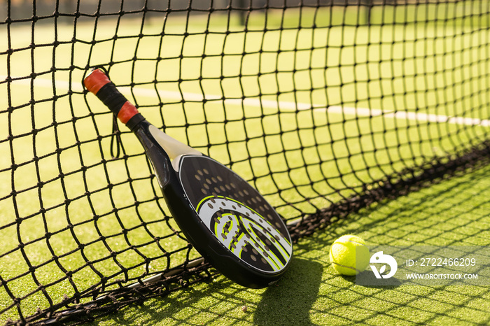 Paddle tennis objects and court.