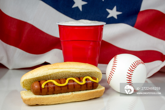 beer in red cup with baseball and hot dog with American flag background