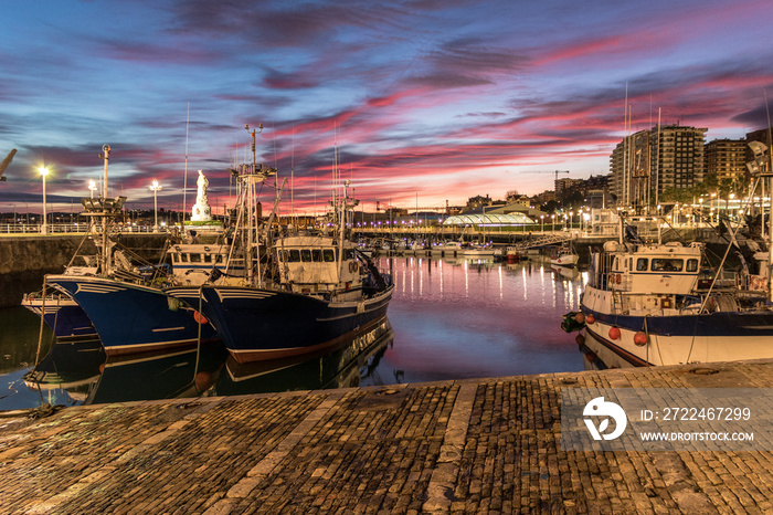 spectacular sunrise in the fishing port of Santurtzi