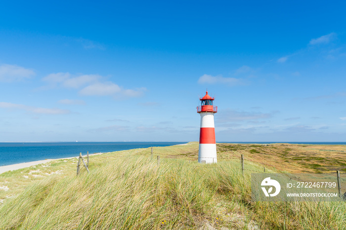 Lighthouse red white on dune. Sylt island – North Germany.