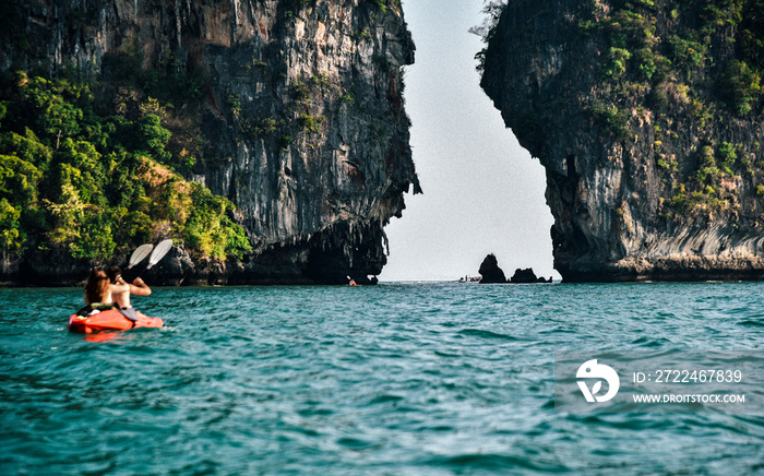 Kayaking along coast near Railay Beach in Thailand