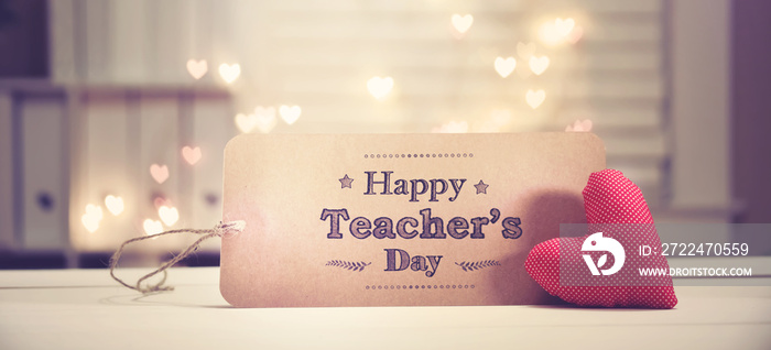 Teacher’s Day message with a red heart with heart shaped lights