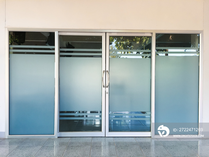 Glassdoors of the meeting room in the first floor of the school building, soft and selective focus.