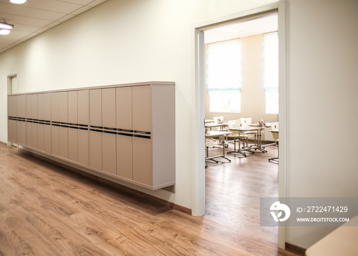 Lockers in empty school hallway