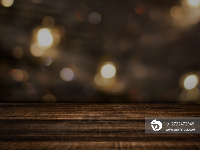 Empty wooden tabletop on dark background with bokeh. Blank space for montage product placement display, montage with a focus in the foreground.