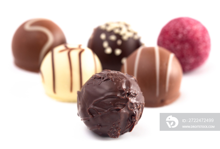 Variety of Chocolate Truffles Isolated on a White Background