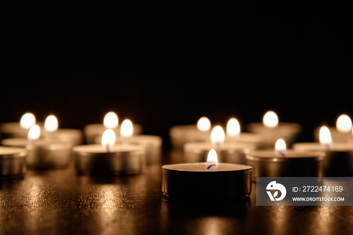 Multiple Candles Lite on wooden table