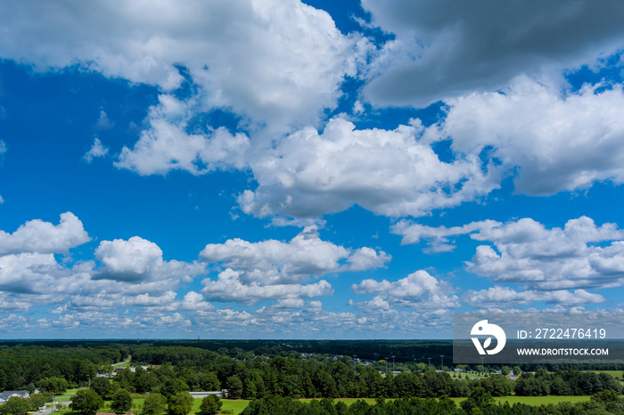 Panoramic aerial view white cloud in horizon summer of residential district at suburban development with between forest in Inman, South Carolina USA