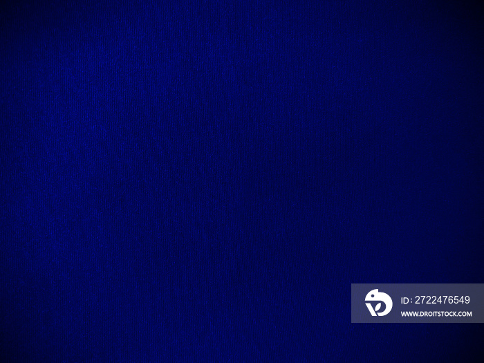 Dark blue velvet fabric texture used as background. Empty dark blue fabric background of soft and smooth textile material. There is space for text.