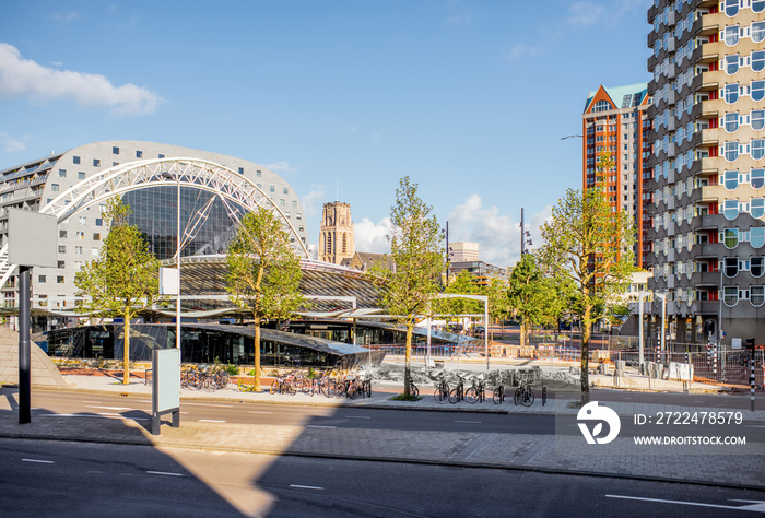 View on the central street with Market hall and central station in Rotterdam city