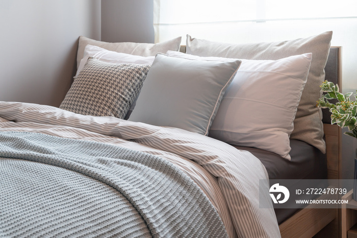 modern bedroom with set of pillows