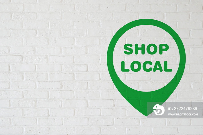 白煉瓦の壁に SHOP LOCAL の文字