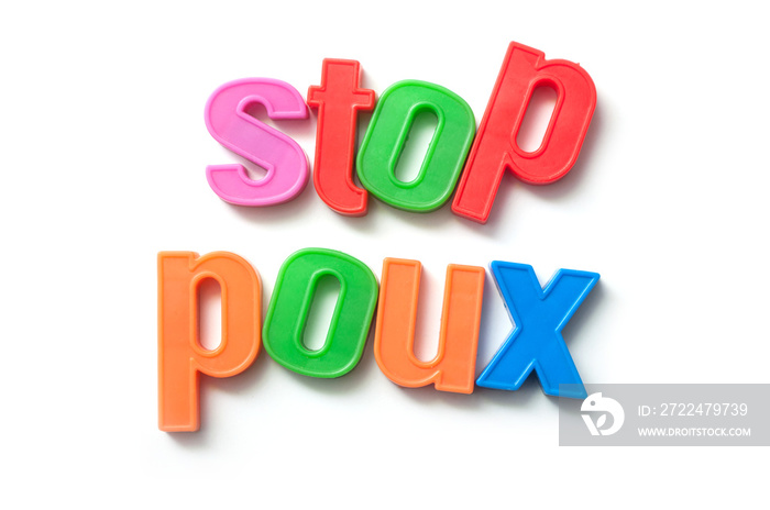 closeup of colorful plastic letters on white background - Stop Poux in french text, traduction in english : Stop Lice