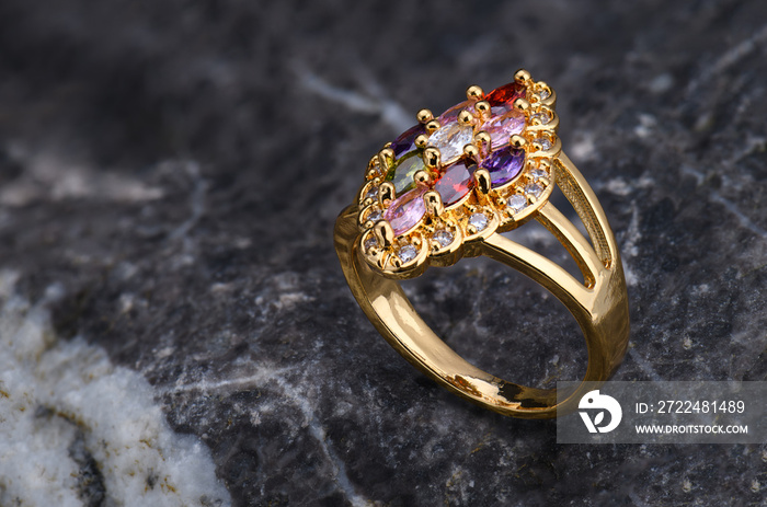 Gemstone jewelry golden ring.