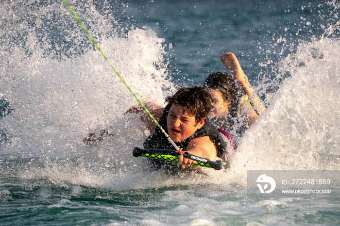 Kids doing watersports