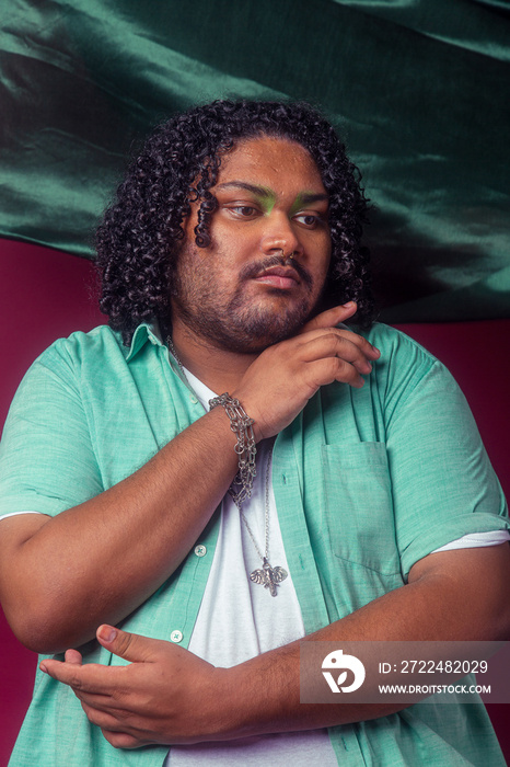 Asian individual fashion colour-blocked studio portrait