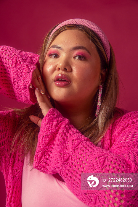 Asian individual fashion colour-blocked studio portrait