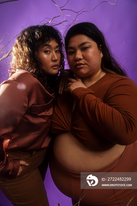 Asian duo lifestyle studio portrait shot