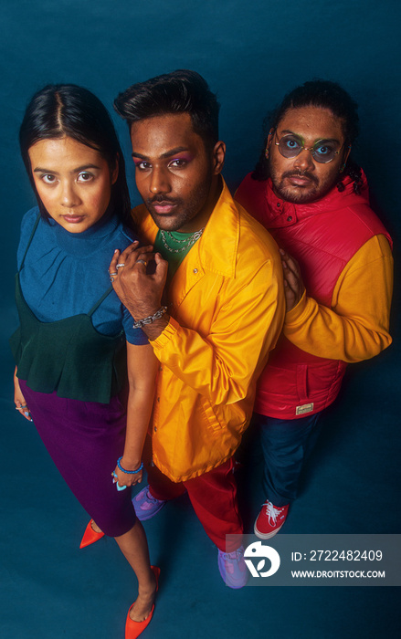 Trio fashion colour blocked studio portrait