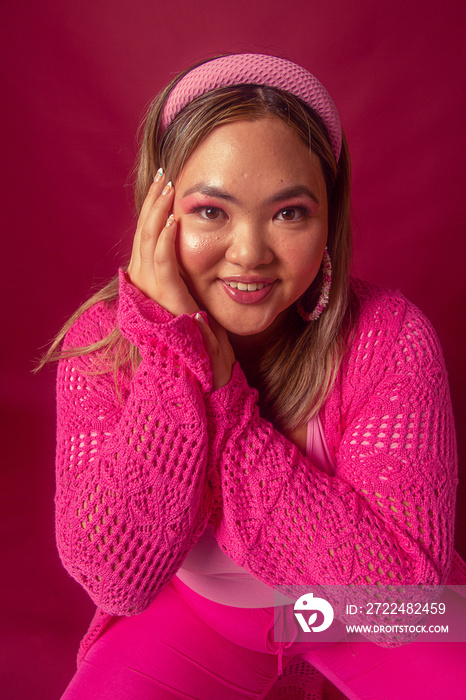 Asian individual fashion colour-blocked studio portrait