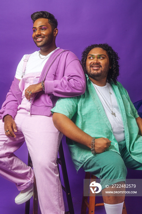 Asian duo fashion colour-blocked studio portrait