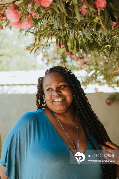 plus size Afro Latinx Haitian American woman looking dreamy