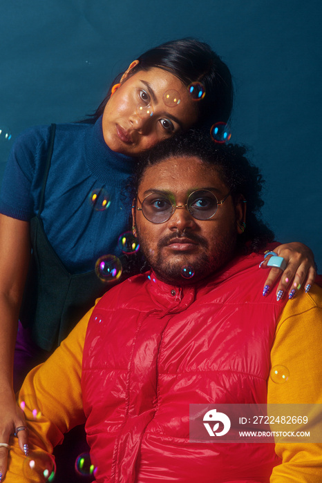 Duo fashion colour blocked studio portrait