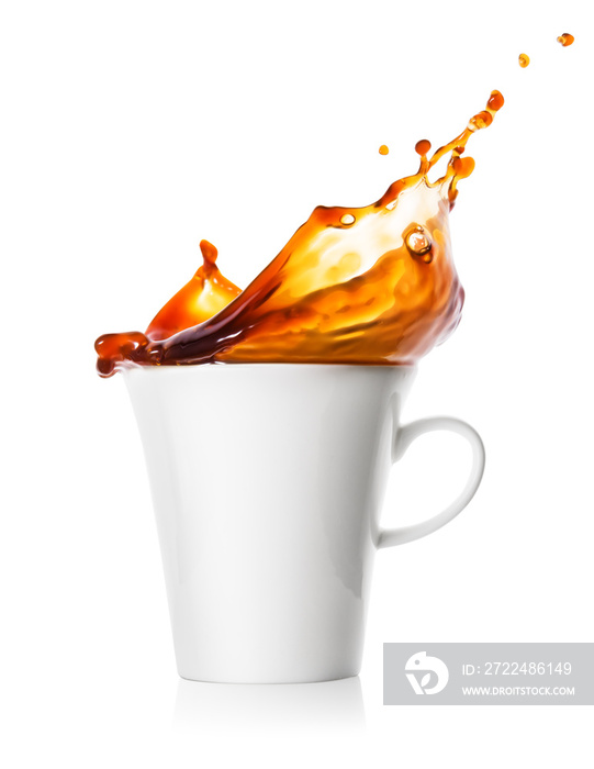 Spray and splash of coffee in cup