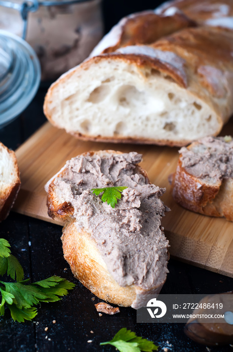 mousse, pate in a jar with baguette and parsley