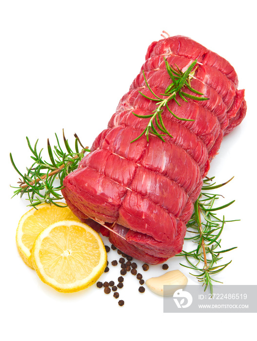 roast of beef with rosemary on white