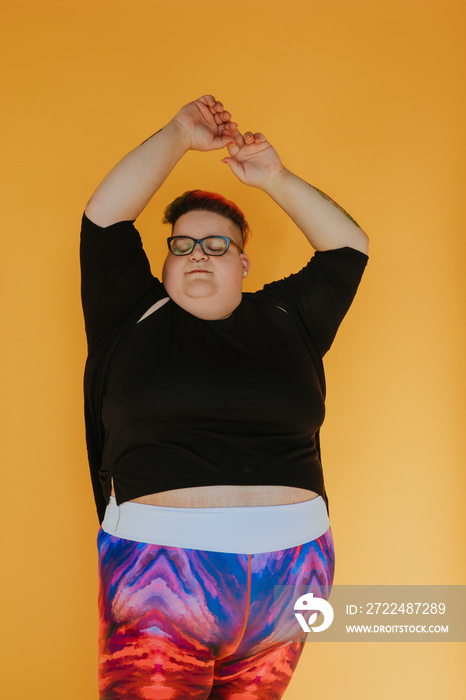 plus size person stretching eyes closed