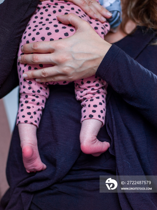 Close-up of woman holding baby son