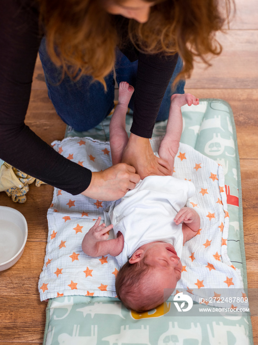 Mother infant daughter’s   diaper