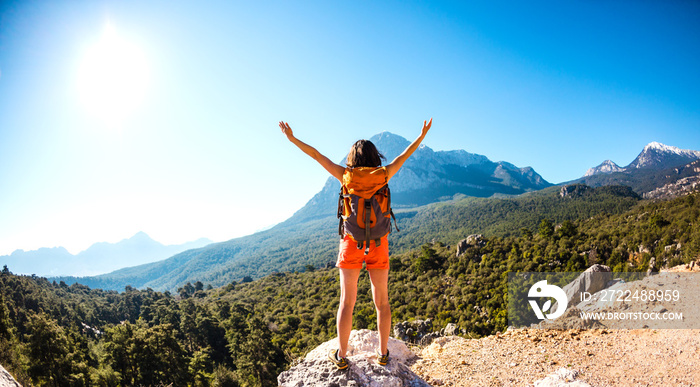 Girl at the top of the mountain.