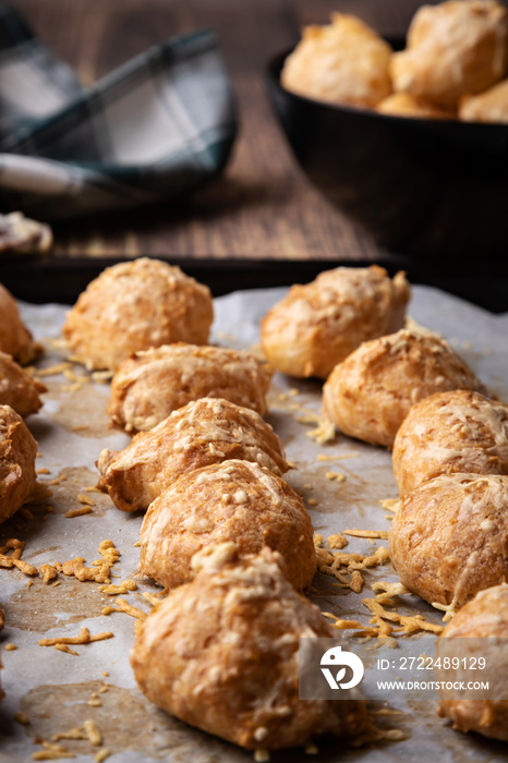 French pastry called  gougere , just after baking on oven plate