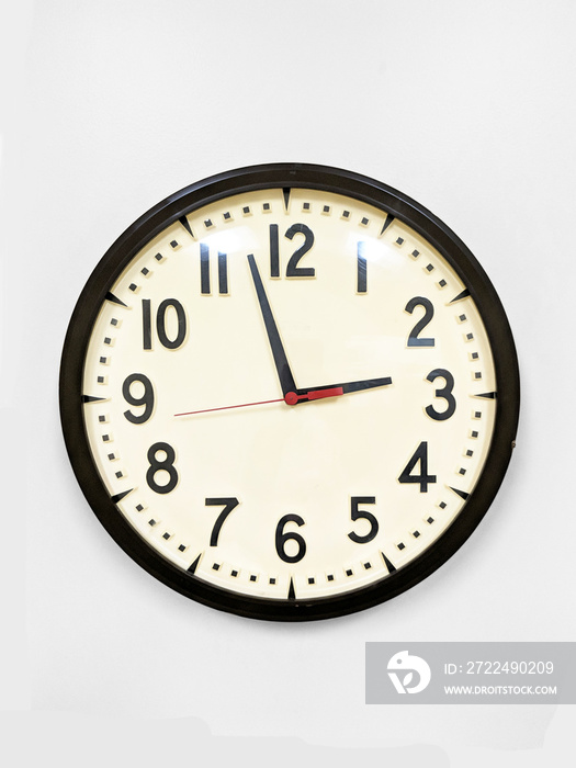 Vintage wall clock isolated on the white background