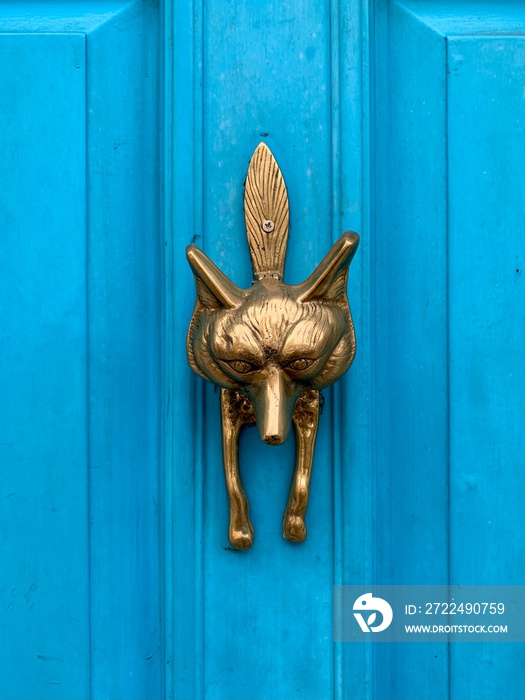 Blue door - freshly painted blue front door with bronze fox as a door knocker