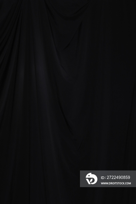 Black Curtain drape wave with studio lighting