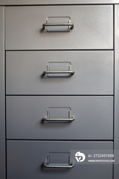 Filing cabinet with closed drawer, Grey silver metal colour, Administration and storage concept