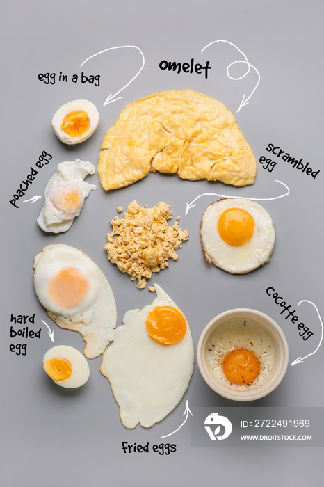 Different delicious egg recipes on grey background