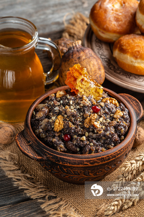 Bowl with kutia Christmas sweet meal. Boiled wheat porridge. traditional Slavic holiday ritual dish