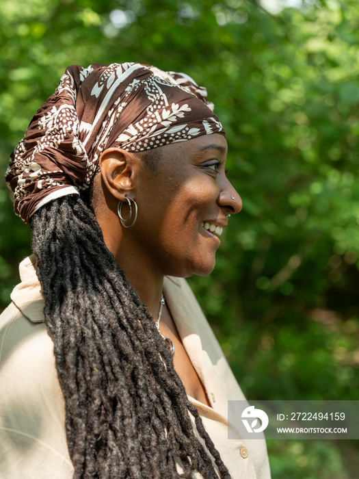 Smiling mature woman on hiking trip