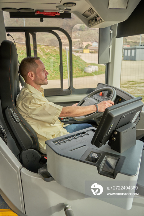 man working in to the city bus driving