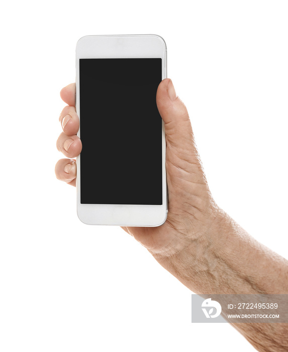 Old woman holding phone on white background