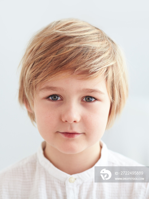 shoulder portrait of cute, nine years old kid, boy for id card