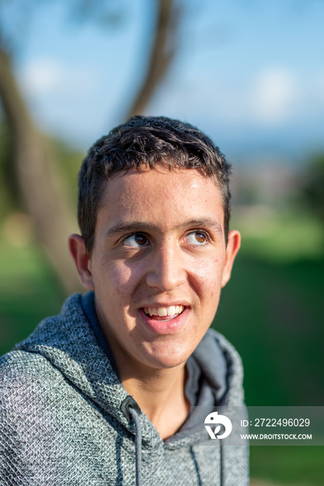 Half body photo of latin teenage boy with black hair