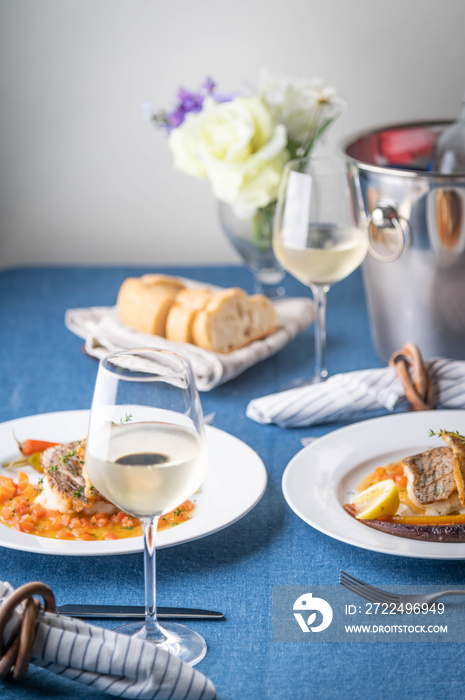 luxury french restaurant image, seabass poele with white wine