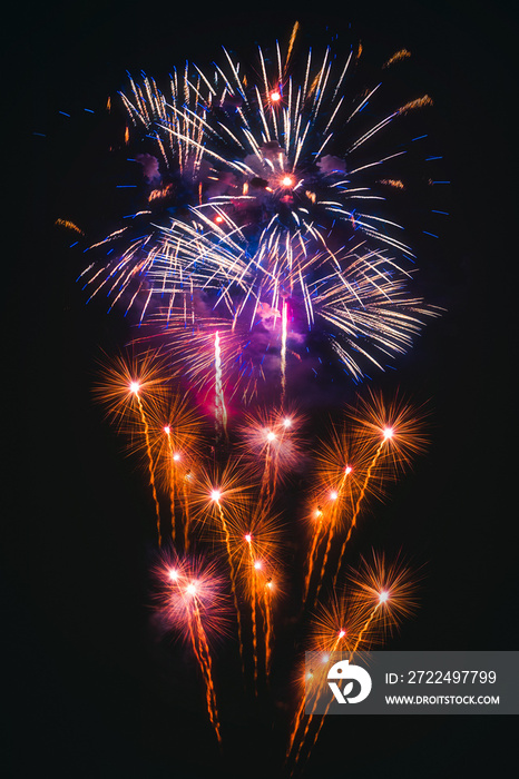 Colorful fireworks explosion on the black background