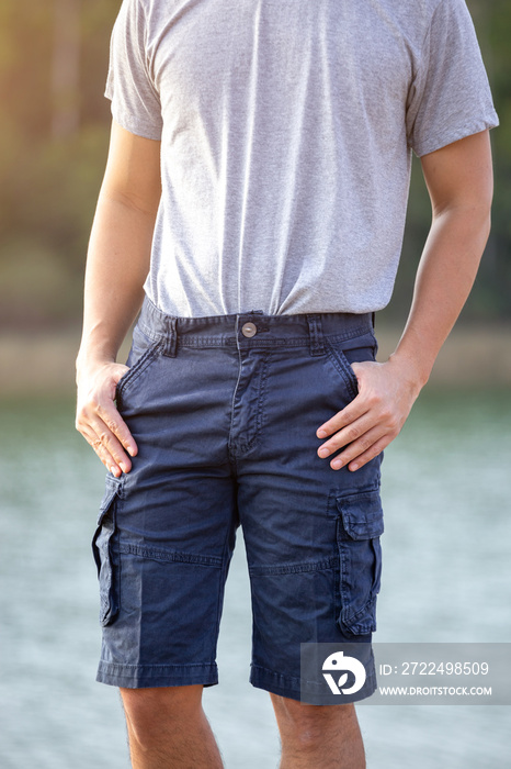 Asia man in bermuda shorts and t-shirt, outdoor activity concept