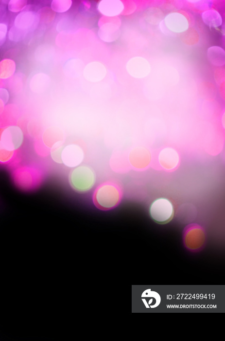 Abstract background with purple bokeh lights